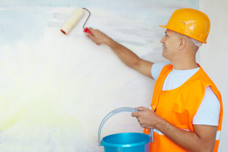 Commercial painters working on a business property in Madison WI